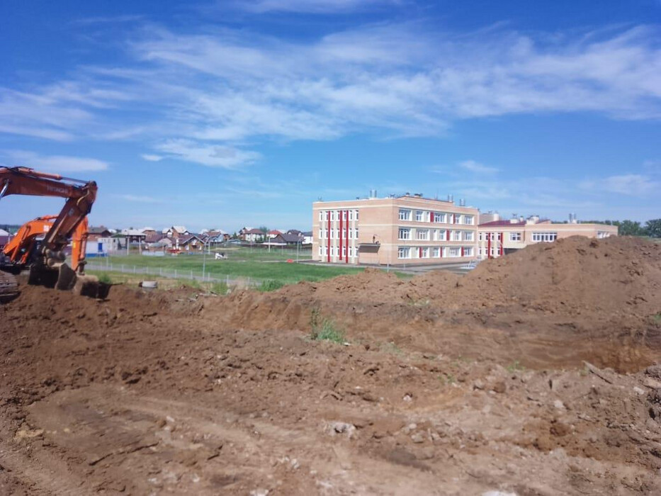 Строительство дороги к школе и десткому саду в Дзержинске